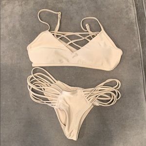 Strapped nude bathing suit